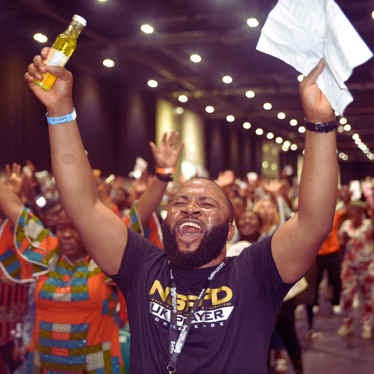 Worshippers praising God at a Streams of Joy gathering